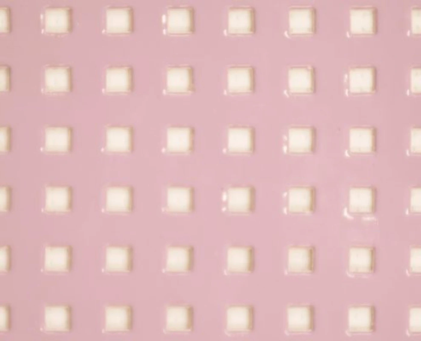 Pink square-perforated PTFE material